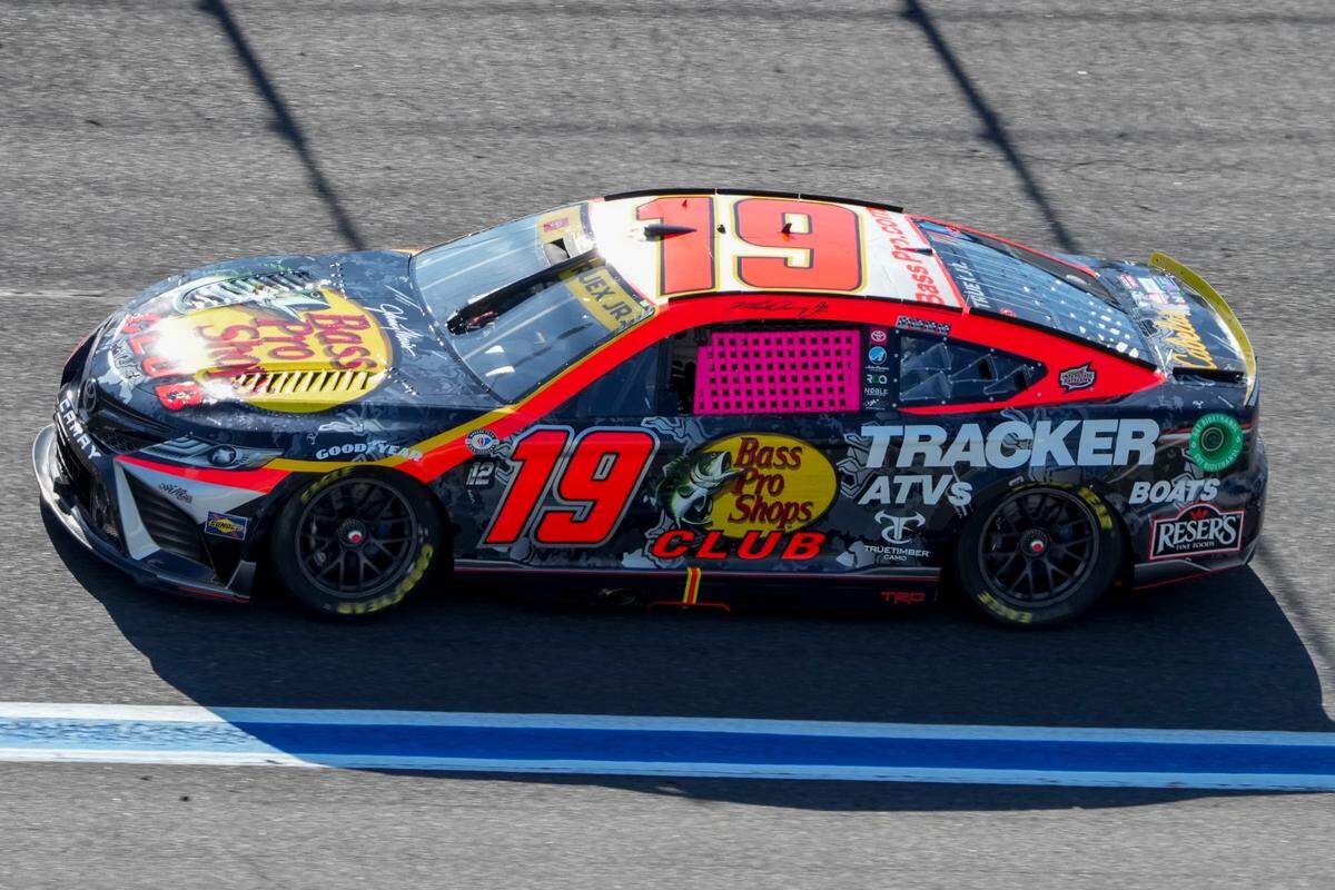 Oct 7, 2023; Concord, North Carolina, USA; NASCAR Cup Series driver Martin Truex Jr. (19) out of turn 8 during Cup practice and qualifying at Charlotte Motor Speedway Road Course. Mandatory Credit: Jim Dedmon-USA TODAY Sports