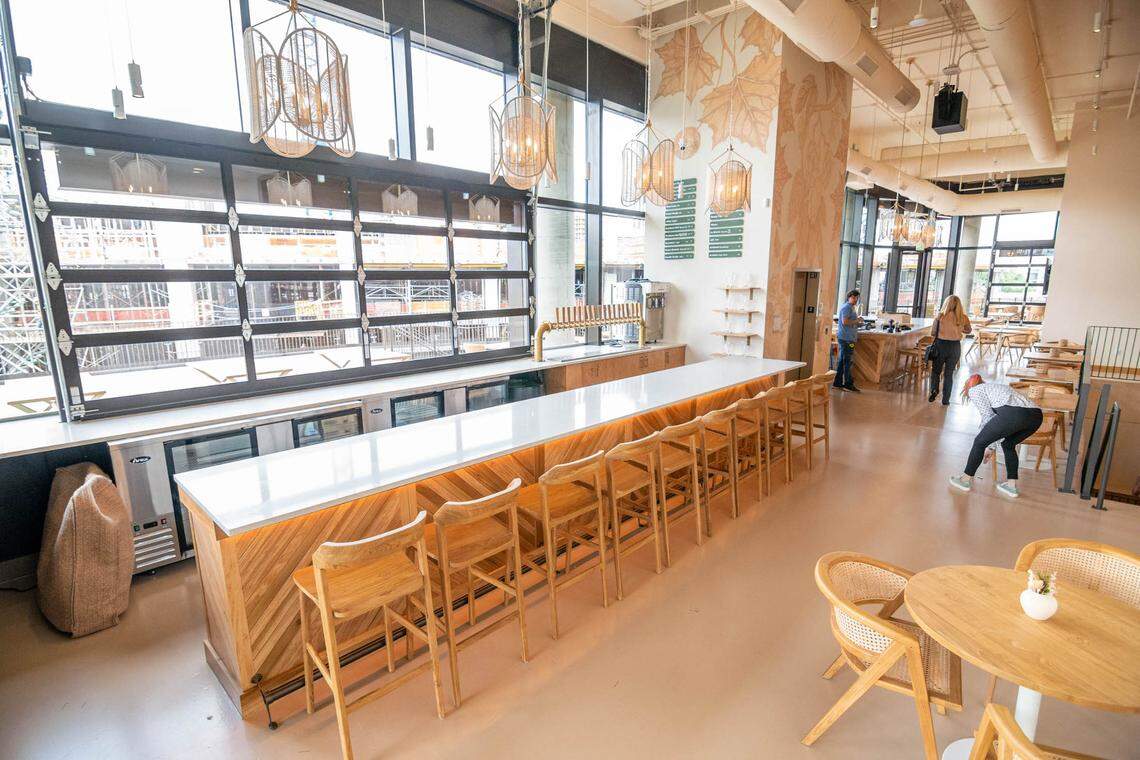 The upstairs bars offers more seating and a garage door to the outside patio.