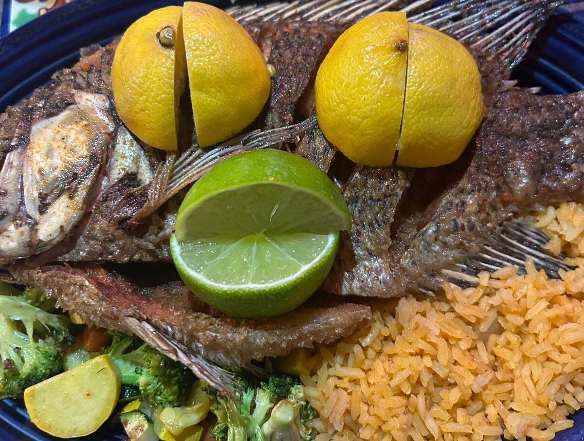 One of El Chapala’s most popular dishes is mojarra, a whole fried fish. Denise Palomera, whose family runs the restaurant, said customers appreciate both the taste and the affordability. “That fish, we could easily raise the amount on it by a few dollars,” she said. “But why would we do that? People love it.”