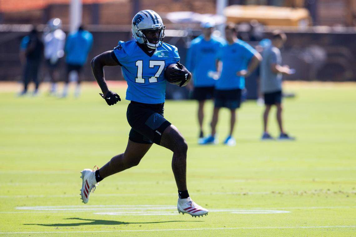 Carolina Panthers wide receiver Xavier Legette (17) runs with the ball during training camp.