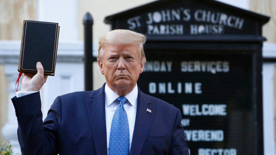 FILE - President Donald Trump holds a Bible as he visits outside St. John’s Church across Lafayette Park from the White House, June 1, 2020, in Washington. Trump is now selling Bibles as he runs to return to the White House. The presumptive Republican nominee released a video on his Truth Social platform Tuesday urging his supporters to purchase the “God Bless The USA Bible.”