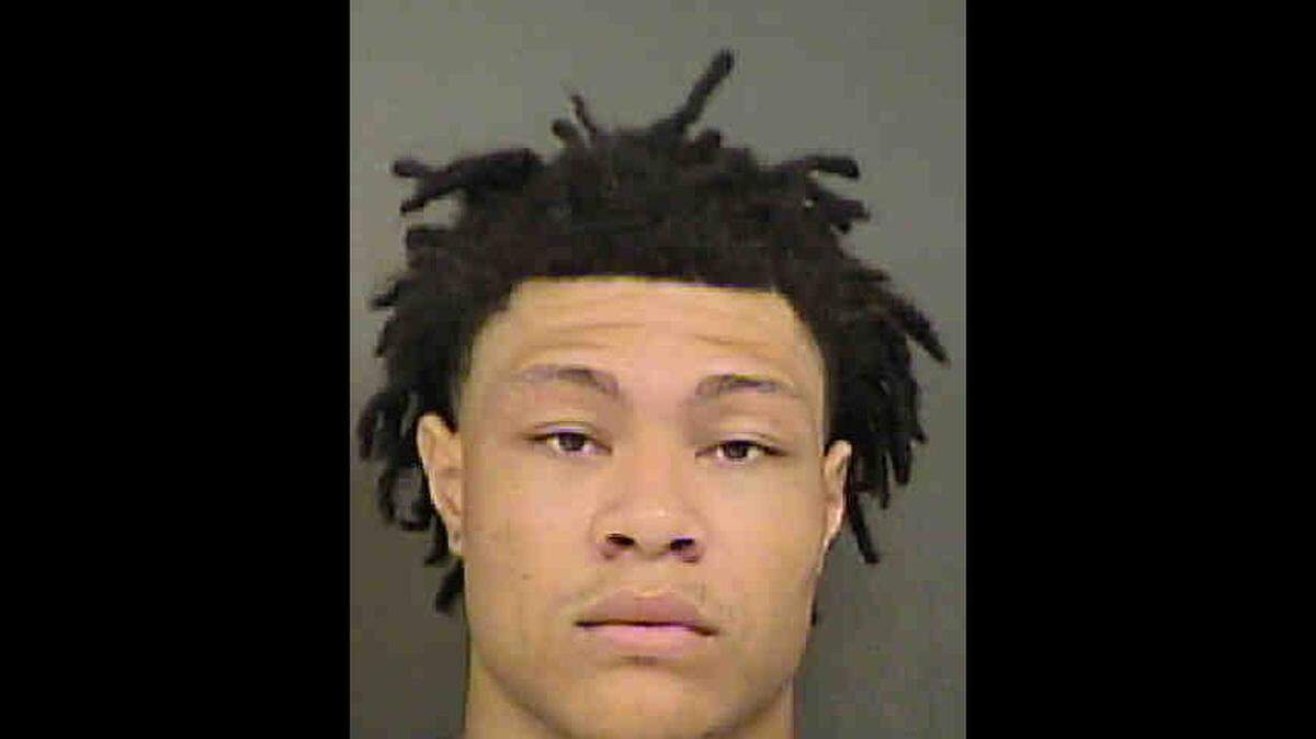 Jonathan Aquante Neal, 21, was charged with several offenses in connection with the sexual assault of an Uber driver in Charlotte, police said.