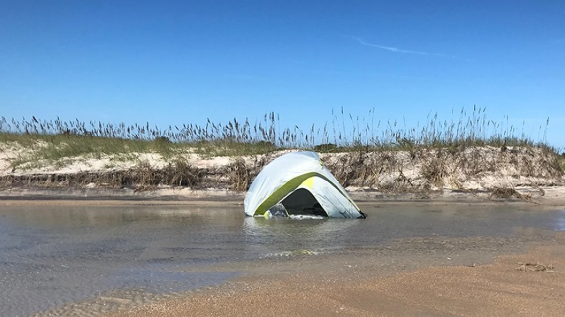 Higher than expected tides surprised some campers at the Outer Banks. They woke up in the ocean.