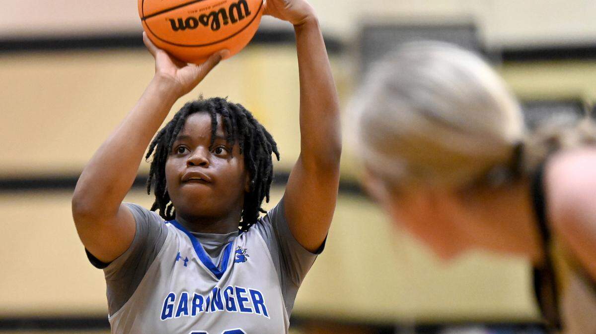 Garinger High freshman guard Misa Harris shoots a free throw during first half action against Providence High Tuesday, February 7, 2023 at Providence High School.