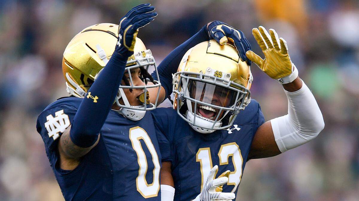 Oct 28, 2023; South Bend, Indiana, USA; Notre Dame Fighting Irish safety Xavier Watts (0) celebrates after an interception against the Pittsburgh Panthers in the second quarter at Notre Dame Stadium.