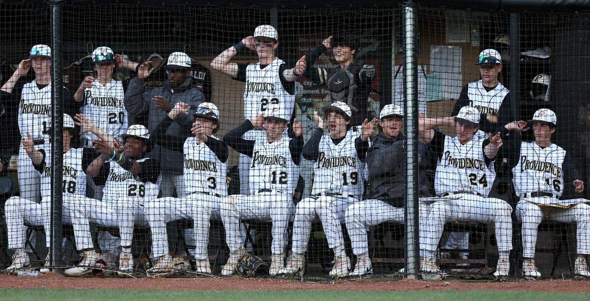 The Providence Panthers dugout show team spirit during action against Hopewell on Friday, April 12, 2024.