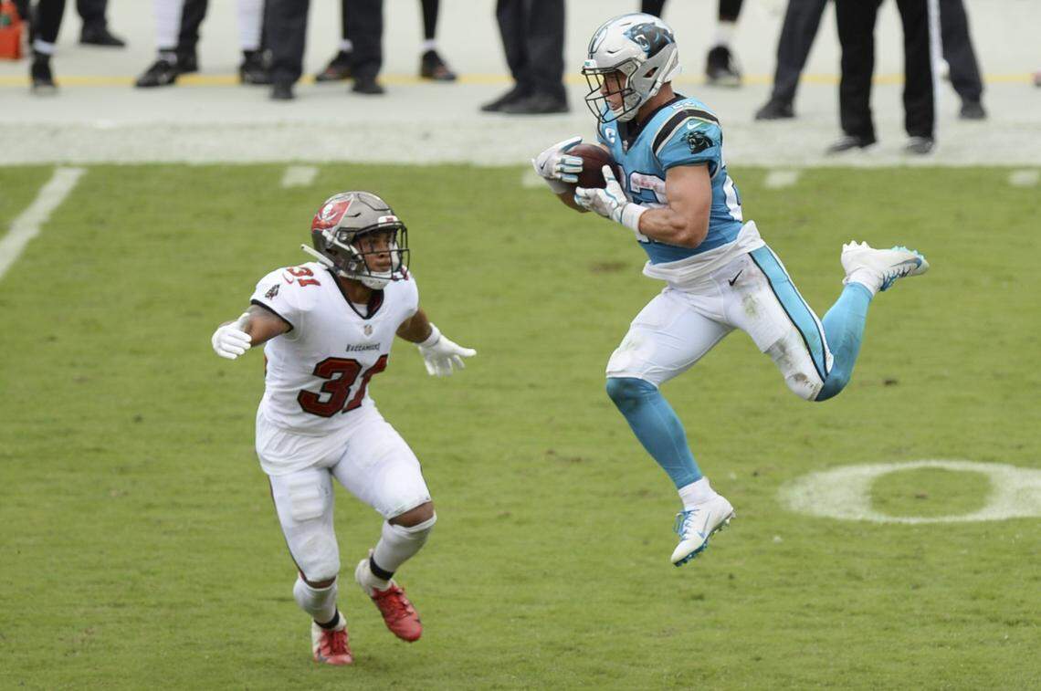 Carolina Panthers running back Christian McCaffrey (22) makes a catch against Tampa Bay in September. McCaffrey had 1,000 yards both rushing and receiving in 2019.