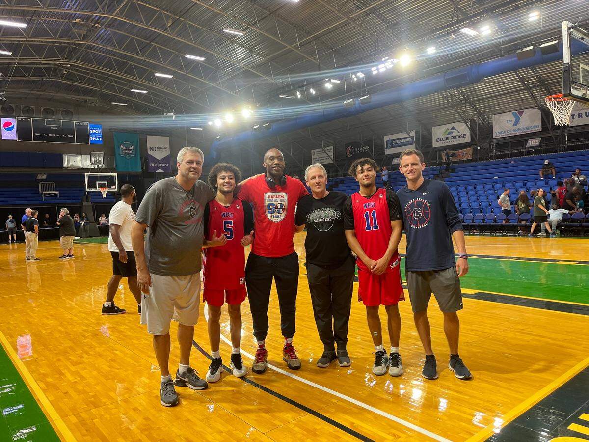 Rob Perron, Catawba College head coach; Carson Daniel; Jolly Manning, former Harlem Globetrotter and Catawba alum; Jim Baker, high school coach; Chase Daniel; Joe Adgate, Catawba assistant.