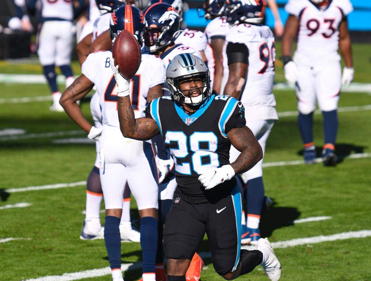 Carolina Panthers running back Mike Davis (28) celebrates after a touchdown during the second quarter of their game Sunday, December 13, 2020.