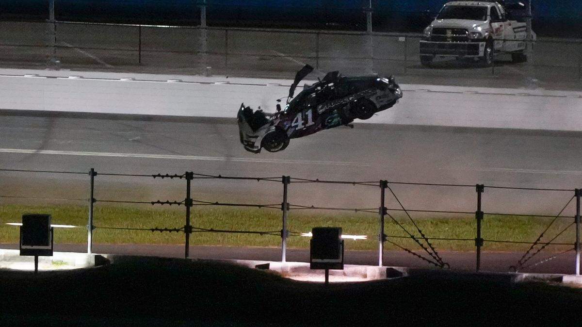 Ryan Preece flips multiple times during the runing of the Coke Zero Sugar 400 at Daytona International Speedway, Saturday, Aug. 26, 2023.