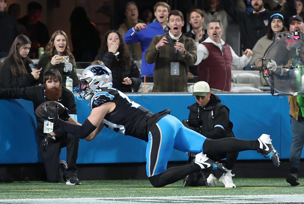 Carolina Panthers wide receiver Adam Thielen appears to catch a pass in the end zone in the closing moments of first half action against the Tampa Bay Buccaneers at Bank of America Stadium in Charlotte, NC on Sunday, December 1, 2024. The call was initially ruled a touchdown but after a review was overturned.