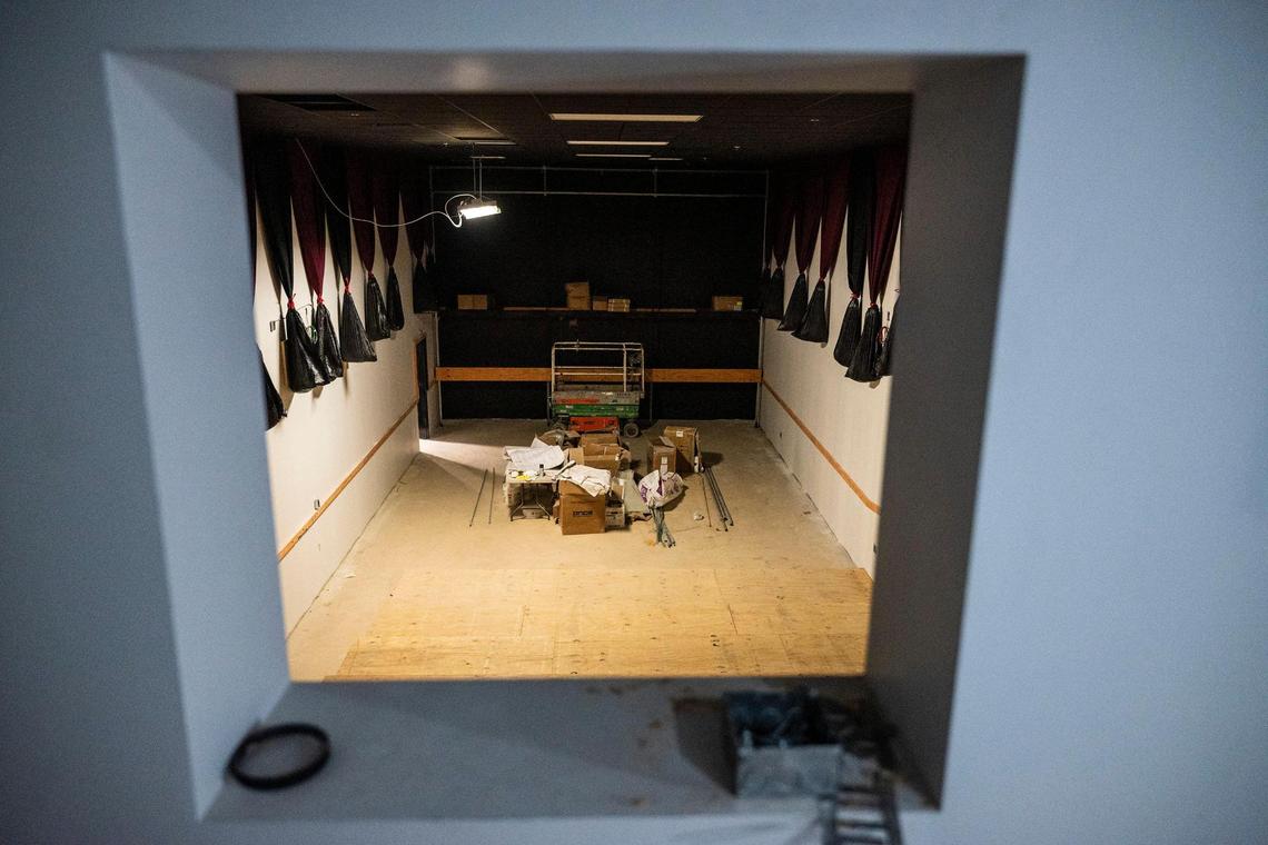 A view Tuesday, March 22, of the cutout from the projection room into one of the auditoriums at Charlotte Film Society’s Independent Picture House expected to open in late spring.