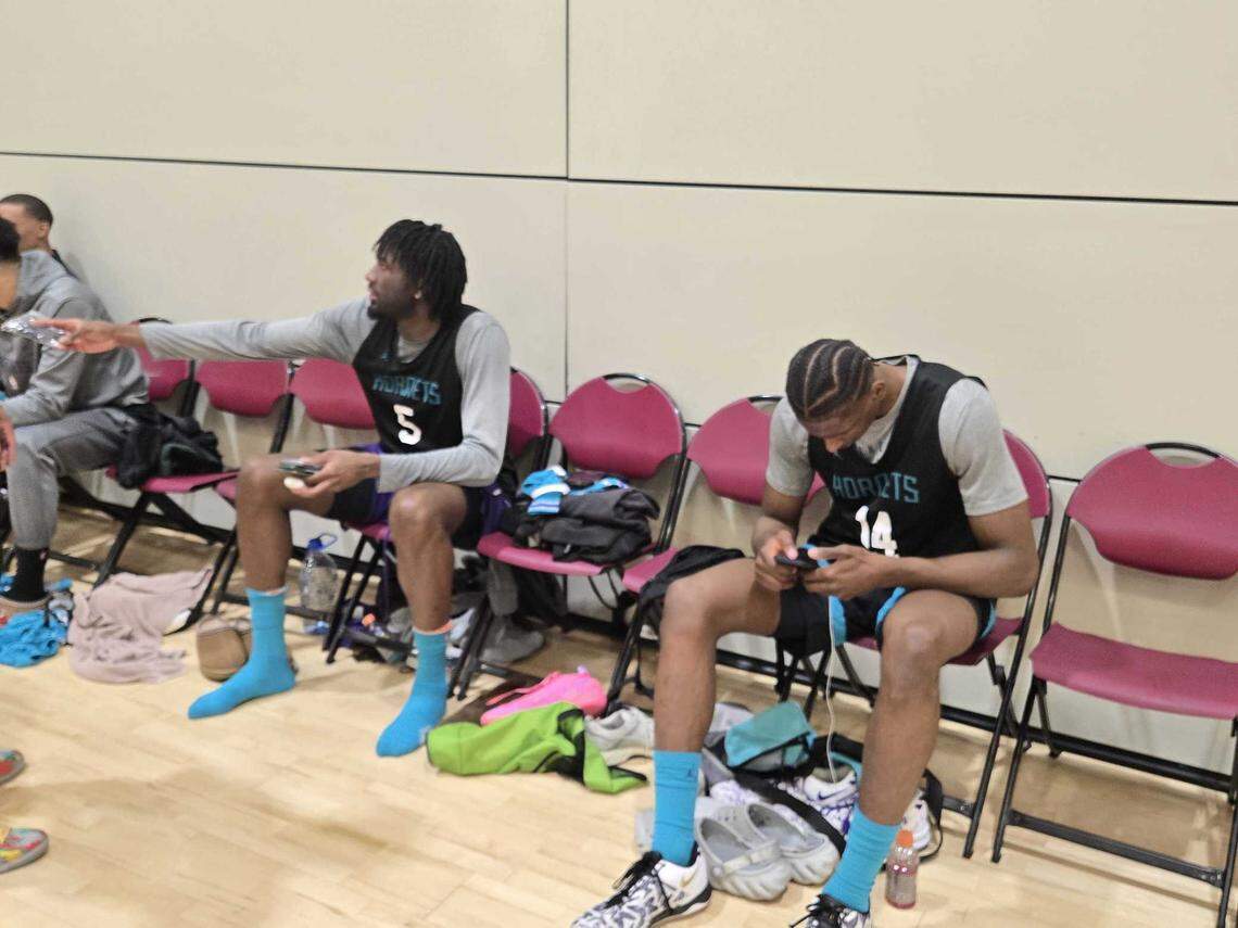 Mark Williams (left) sits next to Moussa Diabate during the Charlotte Hornets’ practice at the University of Southern California’s Galen Center.