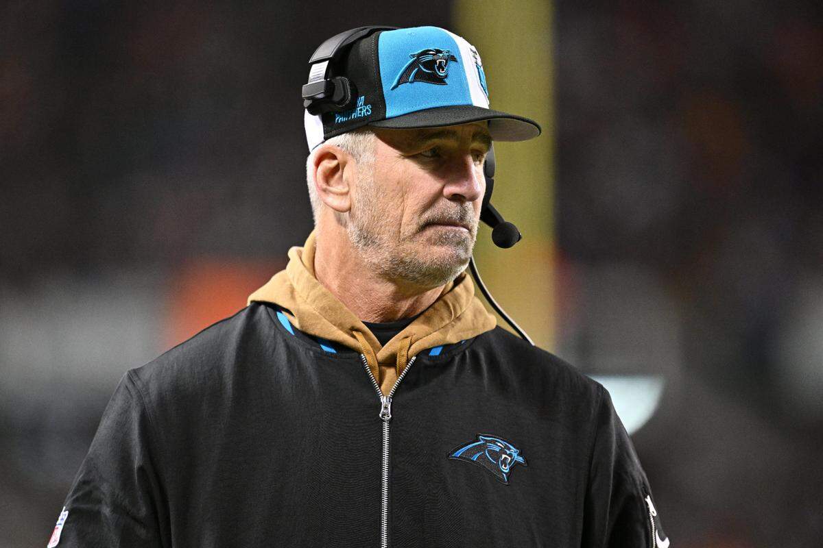 Carolina Panthers head coach Frank Reich watches his team play against the Chicago Bears in the second half at Soldier Field. The Panthers lost, dropping to 1-8, and Reich answered questions about his job security the next day.