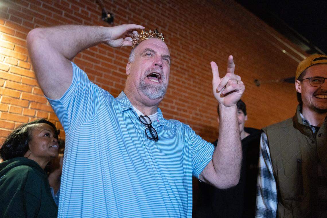 A man, standing at 7-foot-2-inches, is crowned the tallest man during the Tall Tour event at Brewers At 4001 Yancey in Charlotte, N.C., on Saturday, December 6, 2025.