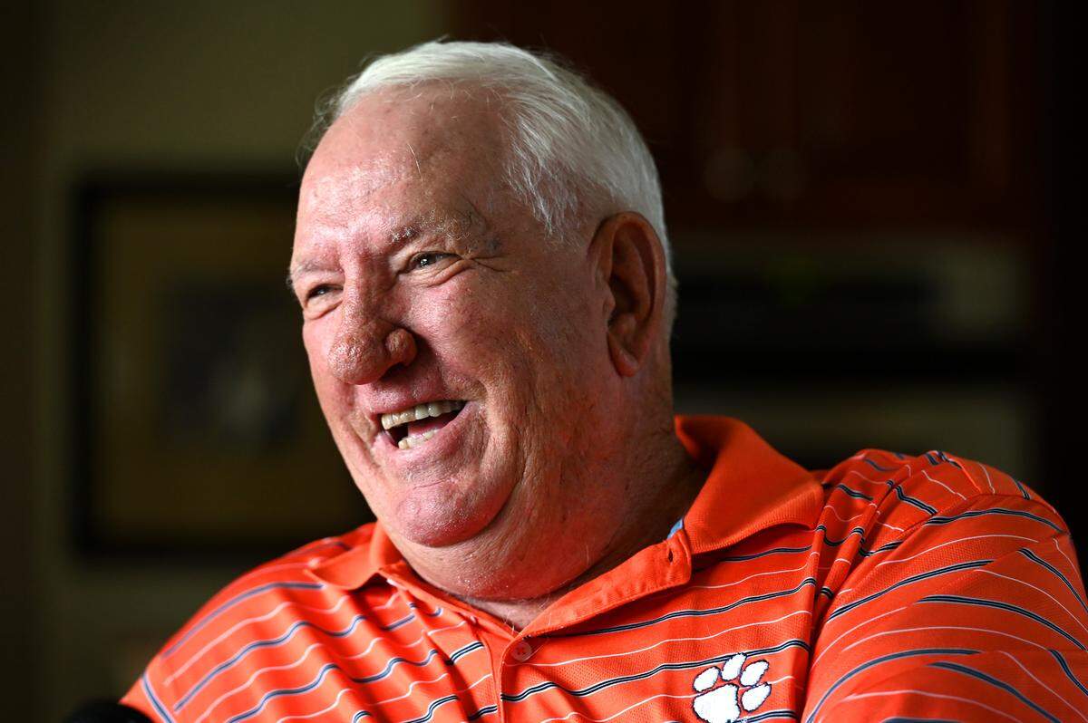 Former Clemson Tigers head football coach Danny Ford laughs as he responds to a question during an interview on Friday, July 22, 2022. Ford led the Tigers to a 12-0 season in 1981.