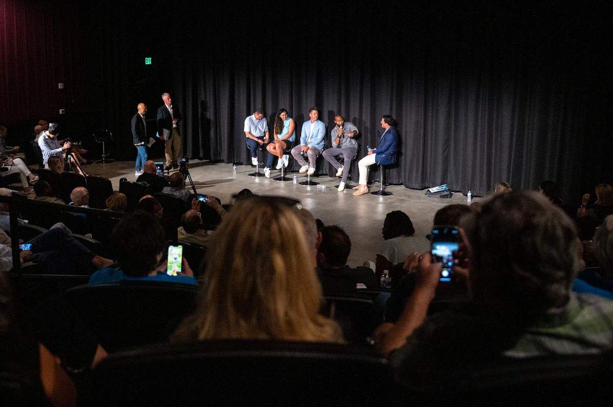 Former Carolina Panthers cornerback Josh Norman, second from right, answers question from the audience during the a panel discussion following the premiere of Super Men at the Independent Picture House in Charlotte, NC on Thursday, July 24, 2025.