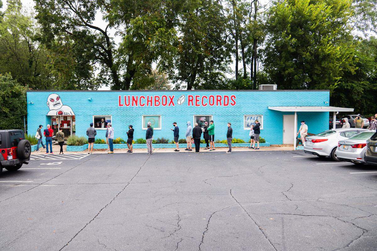 Customers line up outside of Lunchbox Records for a Record Store Day event.