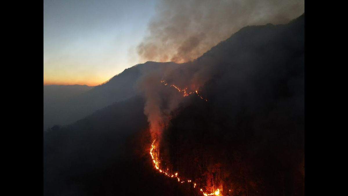 A county in the North Carolina mountains is under a Code Orange air quality alert, as parched conditions spread a nearly two-week-old wildfire, rangers said on Saturday, Nov. 4, 2023.