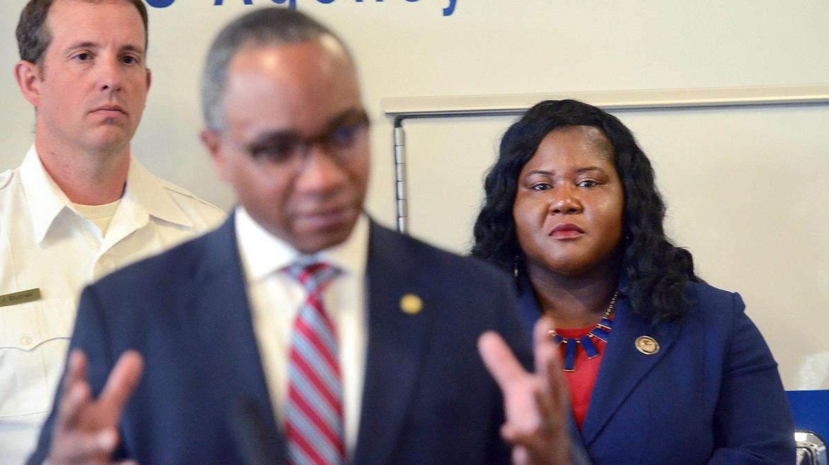 The U.S. Attorney’s Office for the Western District North Carolina on Friday announced the sentencing of the man who was initially accused last year of putting bounties out for arrests of elected officials, including sheriffs and judges. U.S. Attorney for the Western District of North Carolina Dena King (right) listens as District Attorney Spencer Merriweather, speaks during a press conference. 