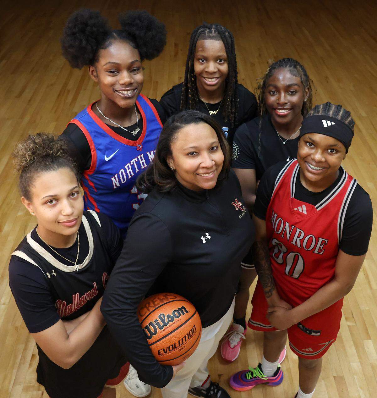 All-Observer girls team members (L-R) Kiara Anderson, Lenise Joseph, Saryah McCorkle, Shauna Holland, Janiya Boyd and head coach Karlyn Dixon on Friday, March 27, 2026.