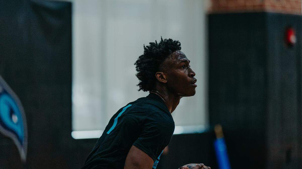 N.C. State product Jarkel Joiner lines up a shot during a workout with the Charlotte Hornets at the Novant Health Training Center on May 2, 2023.