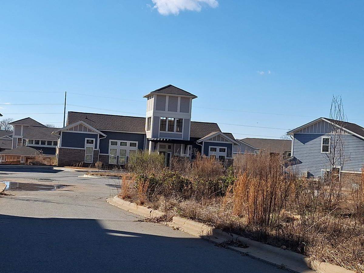 The community clubhouse stands near the entrance to the Pointe at Caldwell Station apartments off N.C. 115 in Huntersville, NC, on Thursday, Feb. 20, 2025.