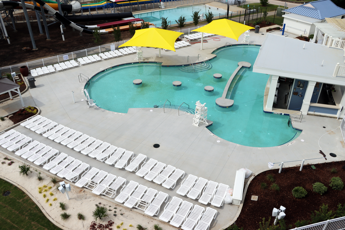 Last year, Carowinds waterpark added 27,280-square-foot retreat area with a swim-up bar for adults as part of Six Flags $1 billion investment over two years.