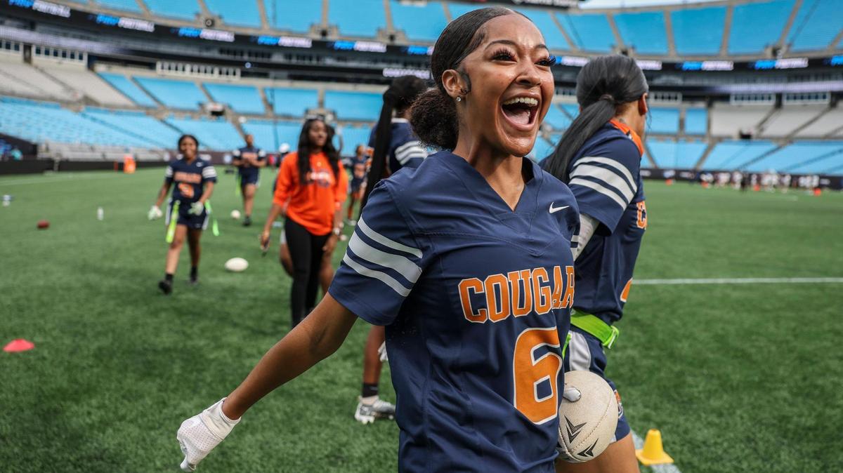 A player celebrates a point during the flag football semi-finals at Bank of America Stadium in Charlotte in 2022.