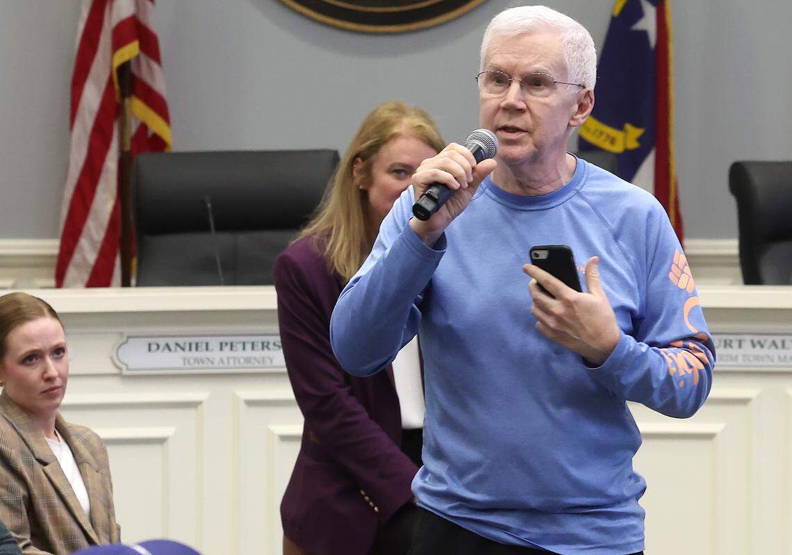 A Matthews resident voices his health concerns about a proposed data center being built in the town during a community meeting at the Matthews Town Hall on Thursday.