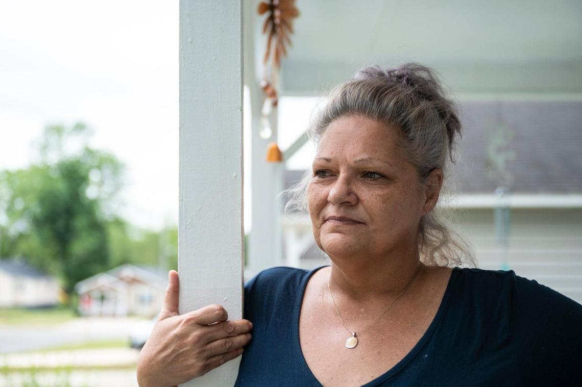 Debbie Briscoe is seen outside of her home on Yandle Lane in the Sterling community on Tuesday, May 24, 2022 in Charlotte. Briscoe, along with many others in the neighborhood, were given thirty days to vacate their rental homes after they were bought by a developer.