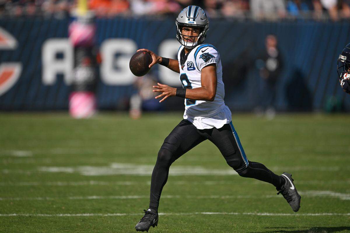 Carolina Panthers quarterback Bryce Young (9) looks to throw against the Chicago Bears during the fourth quarter at Soldier Field.