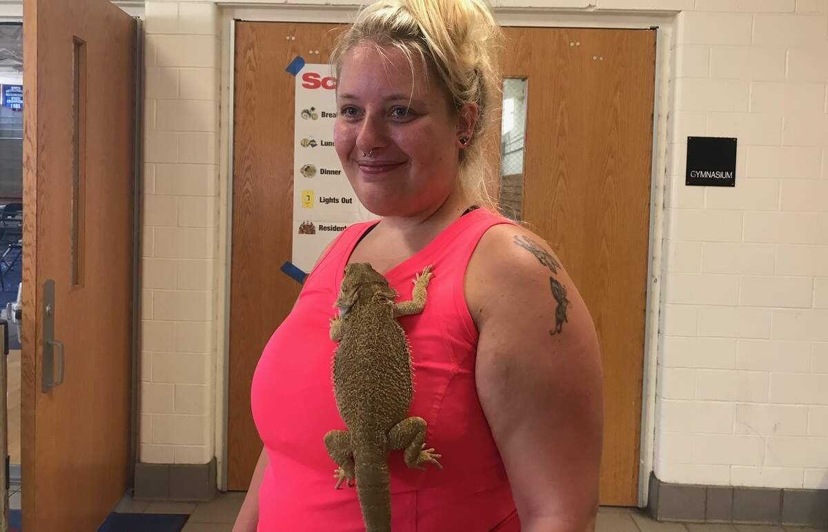Ashley Gilmore and her bearded dragon, Dovahkiin, evacuated from Carolina Beach to the North Mecklenburg High School shelter.