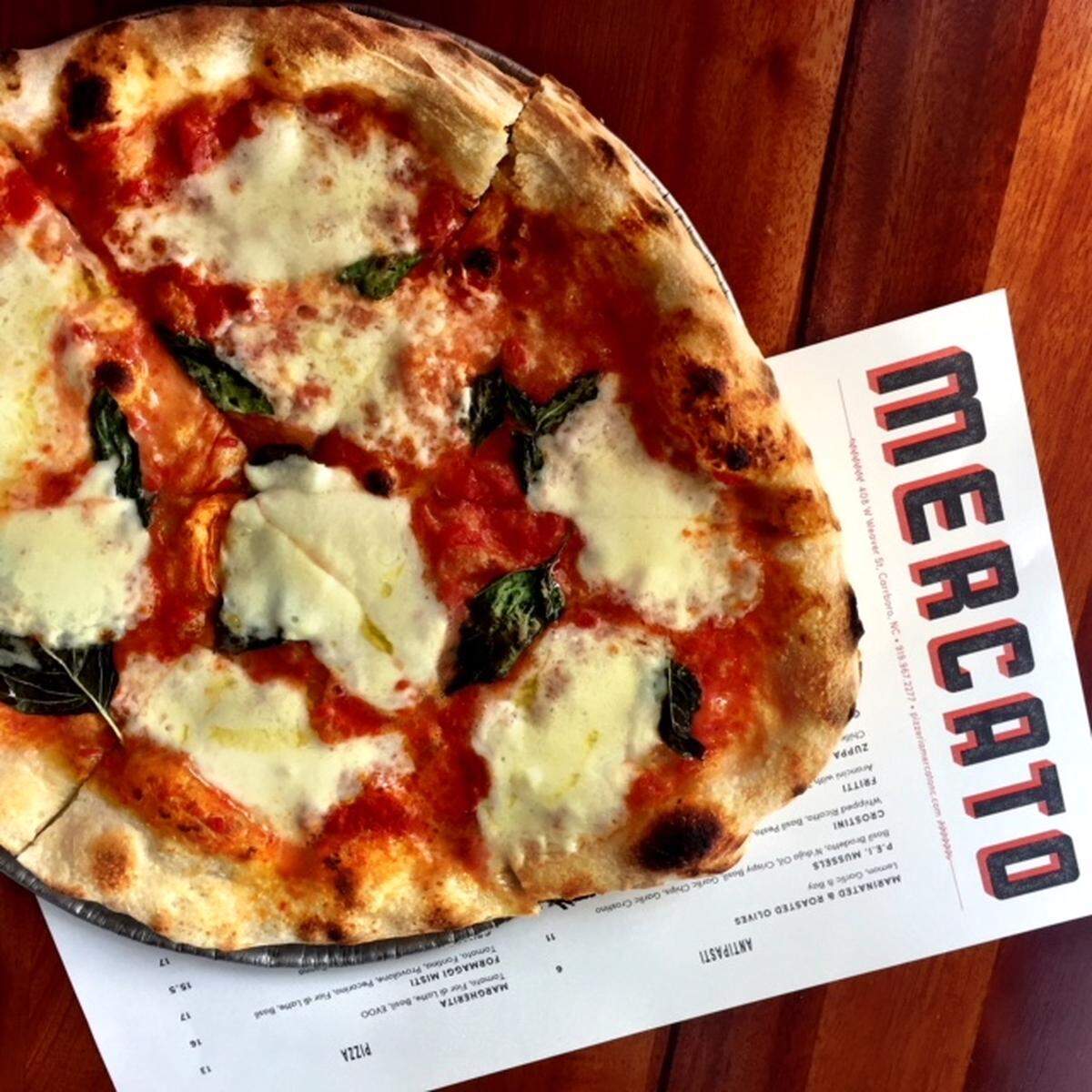 Gabe Barker’s Pizzeria Mercato in Carrboro makes a hand-shaped Neapolitan pie that’s crispier than most.