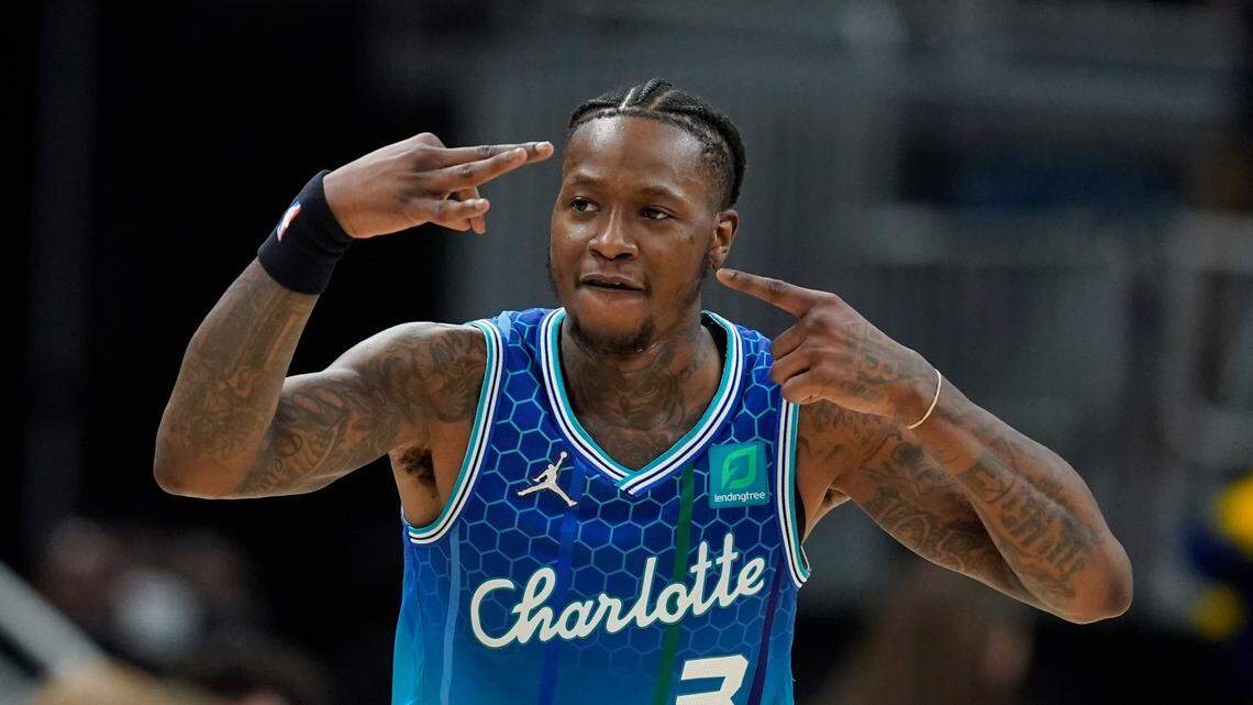 Charlotte Hornets’ Terry Rozier reacts after hitting a three-point shot during the second half of the team’s 116-108 win over the Indiana Pacers on Wednesday in Indianapolis. (AP Photo/Darron Cummings)
