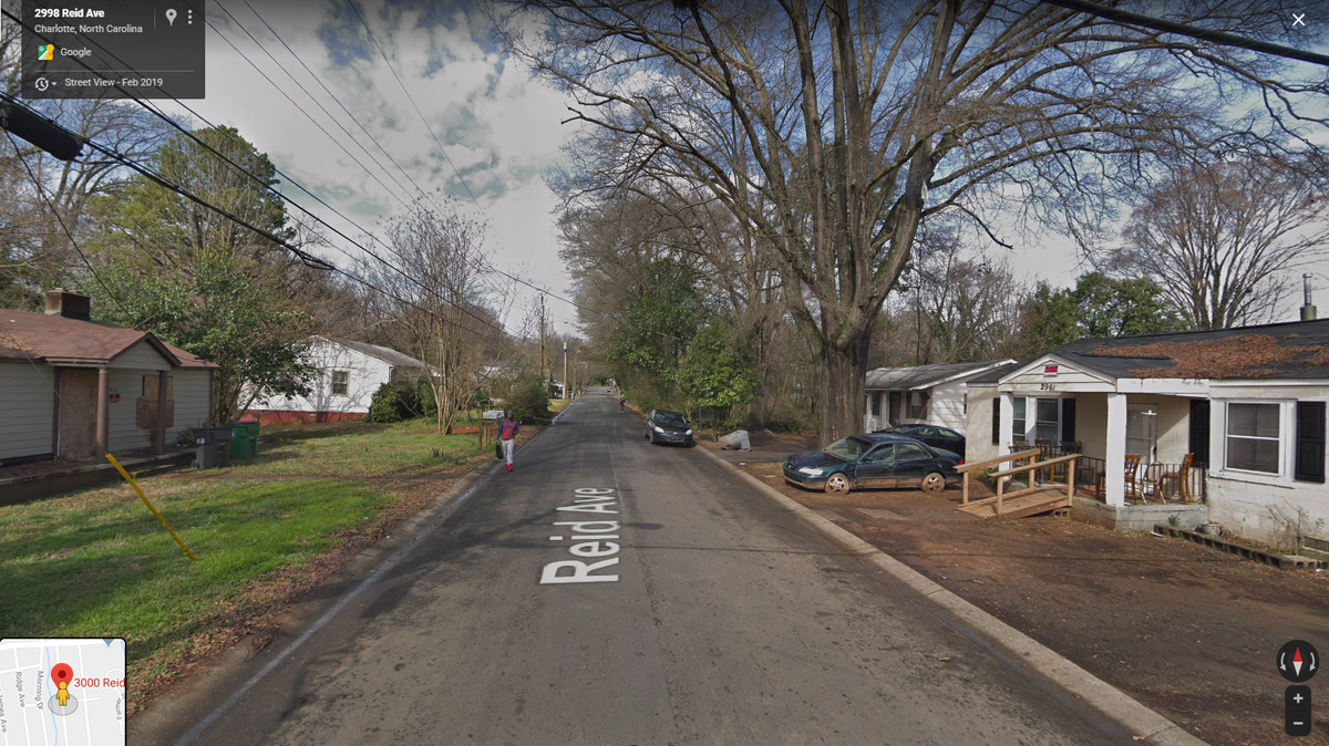 Two men remain on the run after engaging in a shootout with N.C. probation officers Monday in the middle of a southwest Charlotte neighborhood.