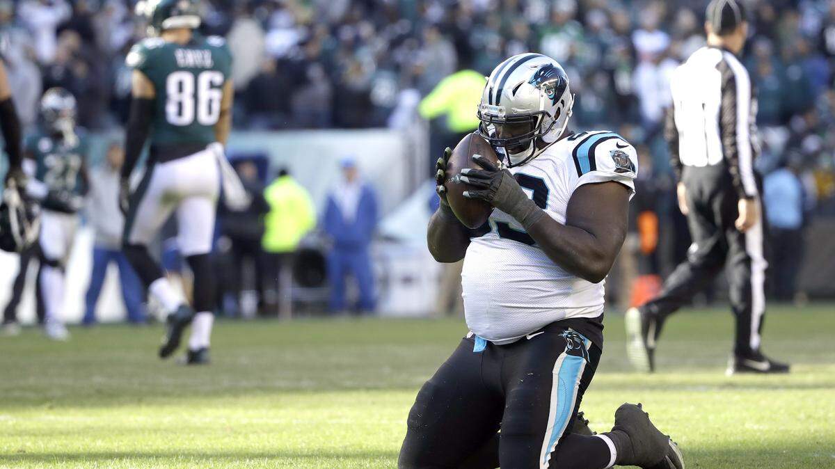 Carolina Panthers defensive tackle Kyle Love celebrates after the Philadelphia Eagles turned the ball over late, allowing the Panthers to run out the clock for a come-from-behind 21-17 victory.