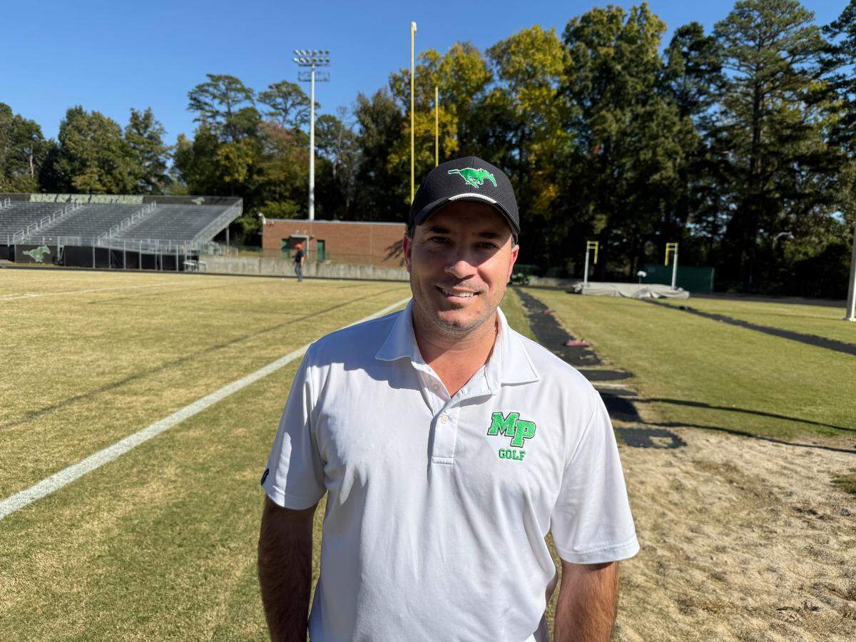 Myers Park girls’ golf coach Jason Lockwood