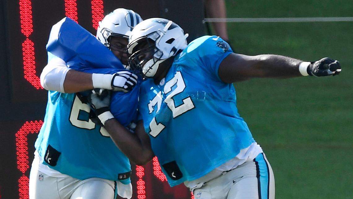 Carolina Panthers offensive tackle Taylor Moton (72), pictured here at training camp in 2020, enters minicamp this year on the franchise tag.