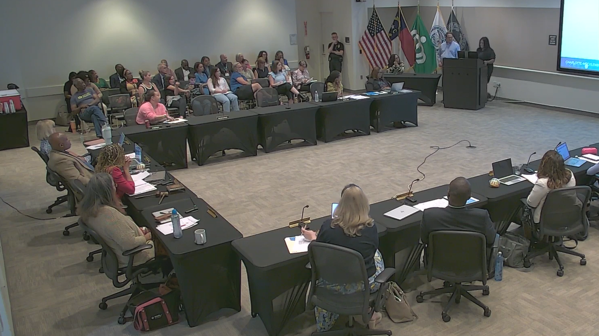 Bettina Thomas speaks about missing wages for summer school work before the Charlotte-Mecklenburg Board of Education on July 9, 2024.