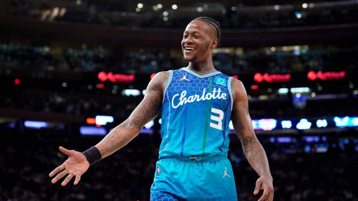 Charlotte Hornets guard Terry Rozier (3) smiles on the court during the second half of an NBA basketball game against the New York Knicks, Monday, Jan. 17, 2022, in New York. (AP Photo/John Minchillo)