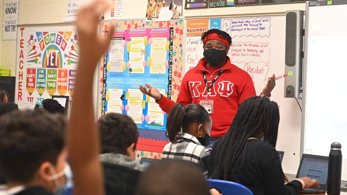 Tyler Adams teaches 5th-grade literacy at Newell Elementary School in Charlotte. Adams is part of a new CMS pilot program with a national organization focused on retaining male educators of color.