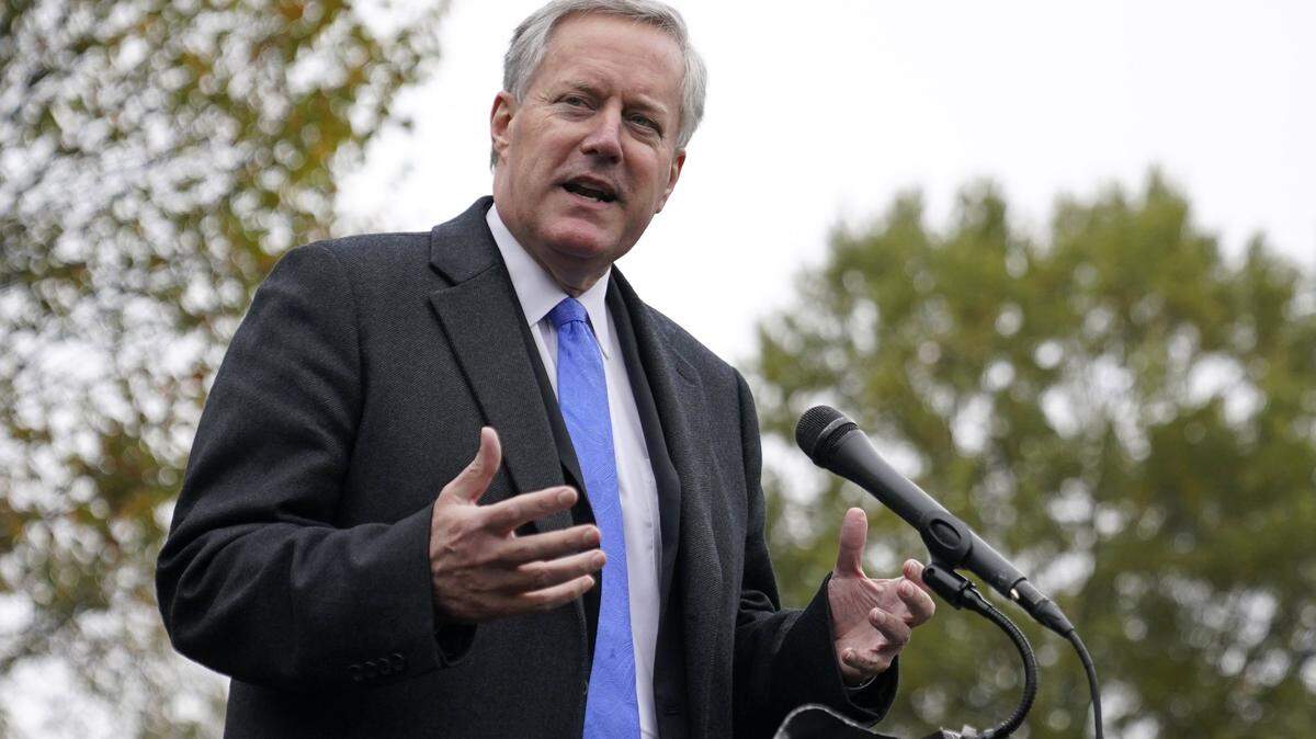 White House chief of staff Mark Meadows speaks with reporters outside the White House, Oct. 26, 2020, in Washington. Meadows, who as chief of staff to President Donald Trump promoted his lies of mass voter fraud, is facing increasing scrutiny about his own voter registration status. Public records show he is registered to vote in two states, including North Carolina, where he listed a mobile home he did not own, and may never have visited, as his legal residence weeks before casting a ballot in the 2020 election.