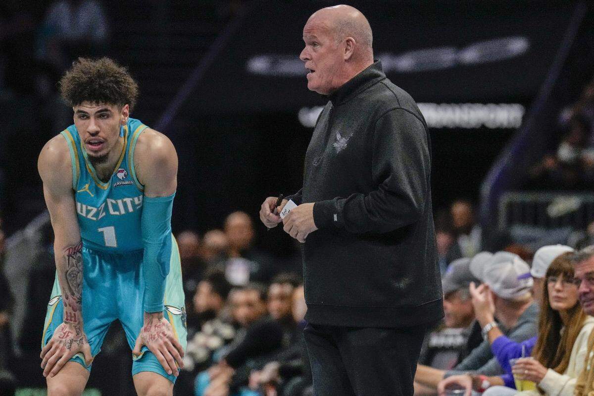 Nov 17, 2023; Charlotte, North Carolina, USA; Charlotte Hornets head coach Steve Clifford  talks with guard LaMelo Ball (1) during a free throw during the first quarter against the Milwaukee Bucks at the Spectrum Center. Mandatory Credit: Jim Dedmon-USA TODAY Sports