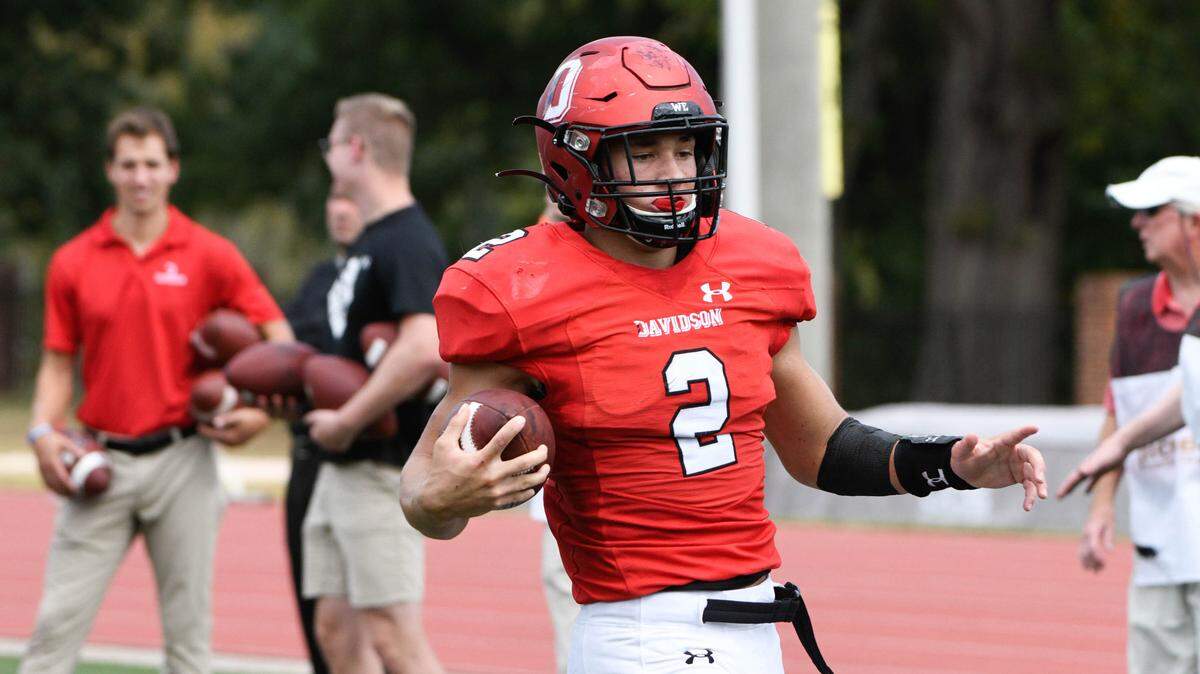Davidson’s Wesley Dugger scores in the Wildcats’ 37-17 loss against San Diego on Saturday.
