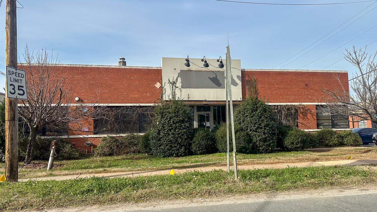Signage has come down at the original NoDa Brewing Company location on North Davidson Street.