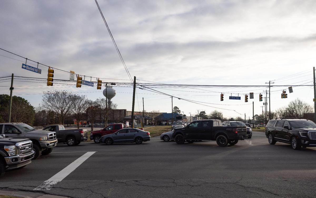 Cars block the N.C. 150 intersection at Williamson Road and Bluefield Road In Mooresville, N.C., on Tuesday, December 14, 2022.