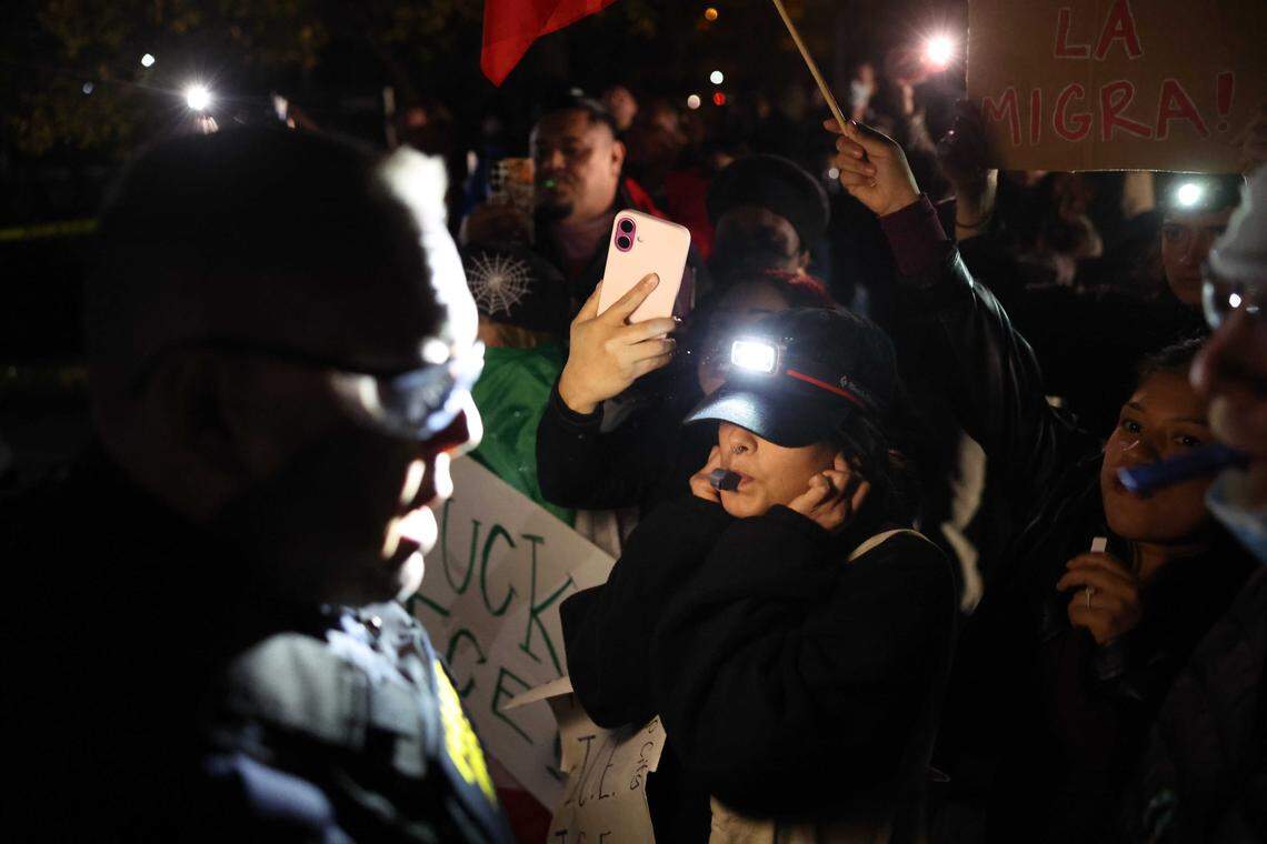 Protesters blow whistles outside the Department of Homeland Security/ICE headquarters on Tyvola Center Drive as protesters gather to voice their concern over the presence of Border Patrol in Charlotte, NC on Sunday, November 16, 2025.