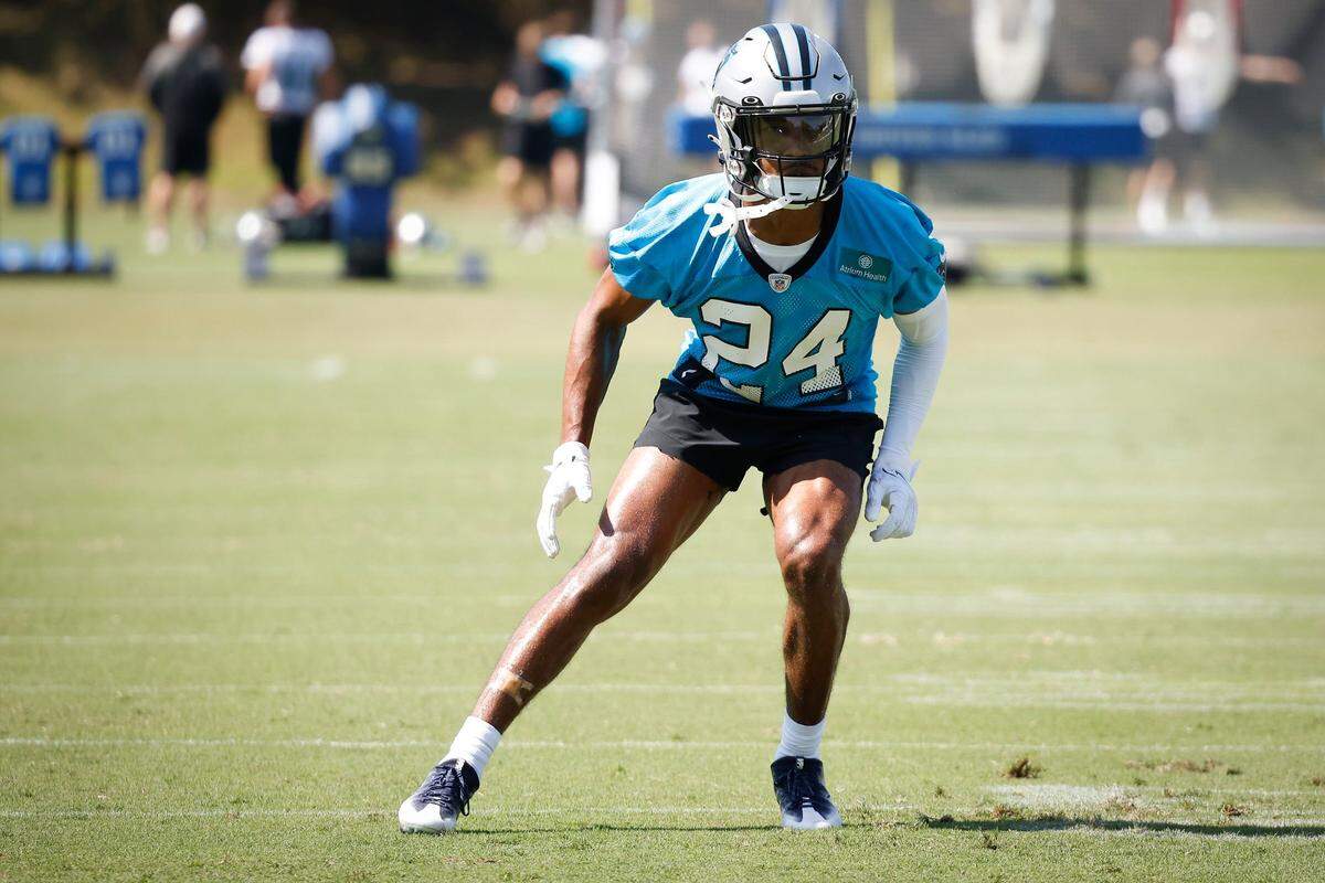 FILE: Carolina Panthers cornerback CJ Henderson (24) runs down field during the teams training camp practice at Wofford College in Spartanburg, S.C., Thursday, July 28, 2022.