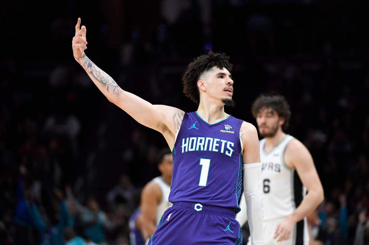 Jan 19, 2024; Charlotte, North Carolina, USA; Charlotte Hornets guard LaMelo Ball (1) reacts after scoring during the second half against the San Antonio Spurs at the Spectrum Center.